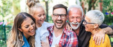 Happy family smiling together, representing successfull immigration and new beginning