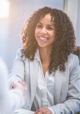 Picture of a smiling well-suited client